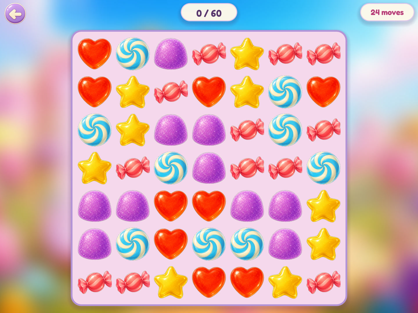 Actual game: a large candy matching board filled with hearts, stars and colorful sweets